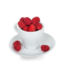 Fresh raspberries in a white cup