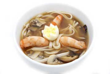 Japanese soup with prawns on a white background