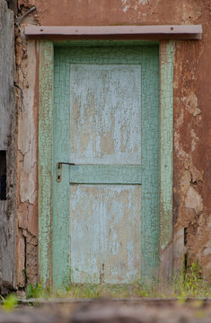 old wooden door with weathered paint