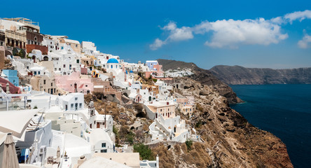 Fototapeta na wymiar Houses on the hillside in the the Greek island of Santorini