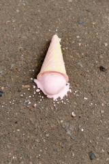 Ice cream fell on asphalt top view