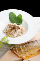 Brown rice risotto with smoked fish and cream sauce