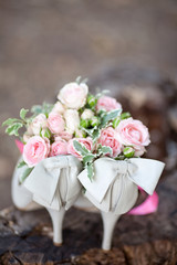 wedding shoes with bouquet