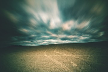 field and clouds - 68295464