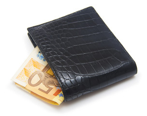 Leather wallet with money isolated on white background