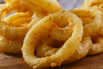 fried onion rings with red sauce
