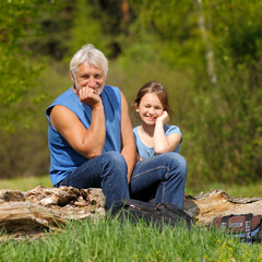 Portrait of grandfather with granddaughter 