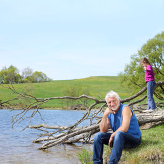 Portrait of grandfather with granddaughter 