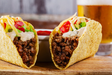 tacos with minced meat with greens and tomatoes