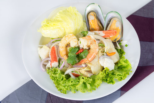 Seafood Salad, thai call "Yum Ta-lay" with shrimp arrange to hea