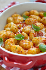 gnocchi with tomato sauce and parmesan cheese