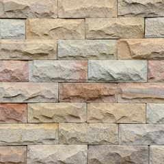 Modern stone brick wall background.
