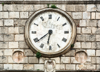 Fototapeta premium Antique clock on a building.