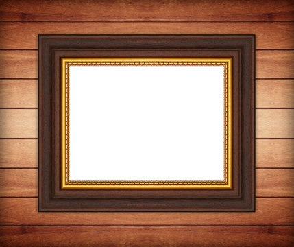 Picture Frame antique isolated on wooden wall background
