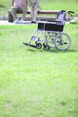 Fototapeta na wymiar 車椅子とシニアのイメージ