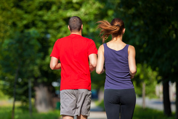 Fototapeta premium Young running couple jogging