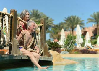 Fototapeta na wymiar Old couple in pool