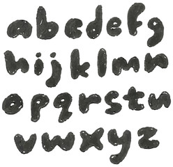 Lower case hand drawn blackened alphabet