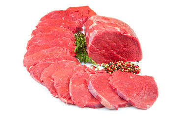 huge red meat chunk and steak isolated over white background
