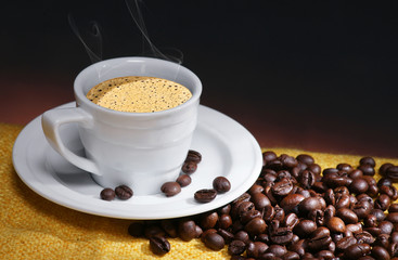 Cup of coffee and coffee beans