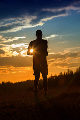 silhouette of a jogger