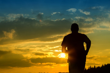silhouette of a jogger