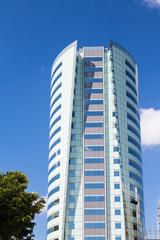 Fototapeta premium Modern Blue And Green Hotel Tower
