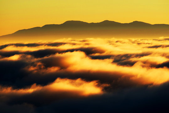 Mountain sea of clouds in sunrise light