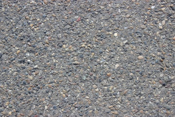 asphalt texture gray background with multi-colored gravel