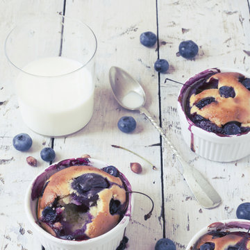 vintage polaroid of clafoutis with blueberries and milk