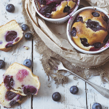 vintage polaroid of clafoutis with blueberries and cherries
