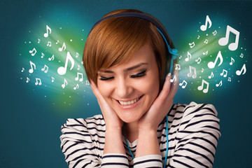 Young woman with headphones listening to music