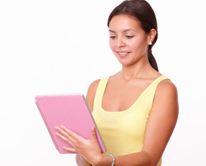 Young charming lady working on her tablet pc
