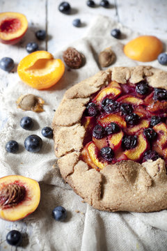 wholemeal french galette with blueberries peaches apricots
