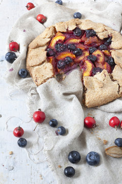 french galette with apricots peaches blueberries and rose hip
