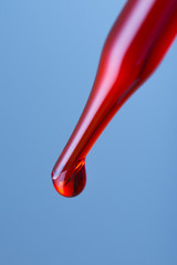 Red chemical drop into test tube