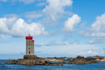 Fototapeta na wymiar Blue sky and the Lighthouse of La Croix