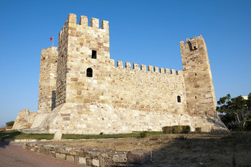 Fototapeta na wymiar medieval fortress in the small port town of Candarli in Turkey
