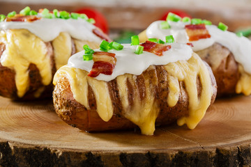 baked potato with cheese and sauce