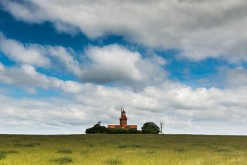 Fototapeta premium Lighthouse in Bastorf at the coast of the Baltic Sea, Mecklenbur