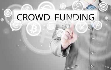 Businessman pushes virtual crowd funding button