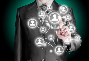 Businessman pressing modern social buttons