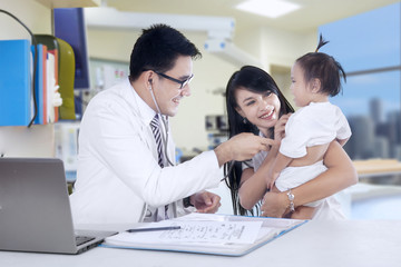 Male pediatrician and his patient 2