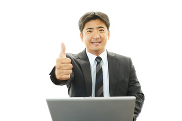 ガッツポーズのビジネスマン