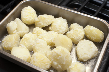 Preparing roast potatoes