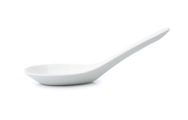 White empty ceramic spoon for soup on white background