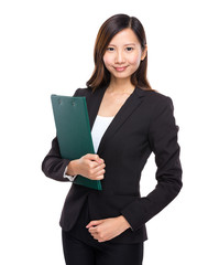 Asian businesswoman with clipboard