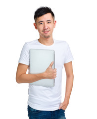 Asian young man with laptop computer