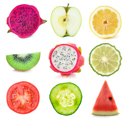 Collection of fresh fruit and vegetable slices on white backgrou