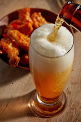 beer pouring into glass